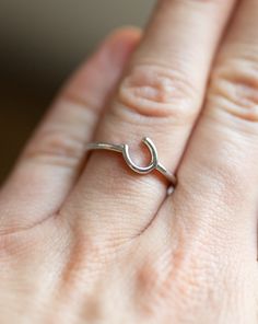 Bridle Up Hope introduces this beautiful ring! Notice the horseshoe is turned to an angle. Sometimes life gives you unexpected twists and turns, but you always have a choice on how you react. Made from high quality 925 sterling silver. Gold rings are dipped in 14k gold. A Bridle Up Hope original design. Stay strong and steady, just like this ring represents. Remember the wise words from Stephen R. Covey: "Happiness, like unhappiness, is a proactive choice." 100% of profits go to the Bridle Up Ho Diamond Horseshoe Ring, 14k Gold Horseshoe Ring, Elegant Gold Horseshoe Rings, Silver Horseshoe Ring As Gift, Elegant Horseshoe Rings For Gifts, Classic Sterling Silver Horseshoe Jewelry, Silver Horseshoe Ring For Gift, Silver Adjustable Horseshoe Rings, Luxury Gold Horseshoe-shaped Jewelry