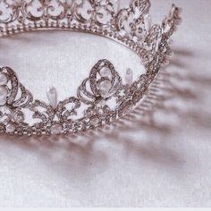 a tiara is shown on a white surface