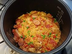 the food is prepared and ready to be cooked in the crock pot on the stove