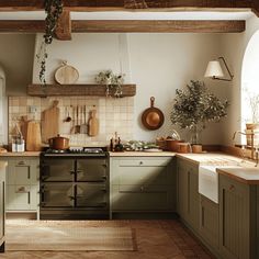 An English countryside kitchen featuring a color palette of warm, earthy hues and natural accents, evoking a sense of comfort and rustic charm Warm Kitchen Colors, Kitchen Mantle, Farmhouse Cottage Kitchen, English Cottage Kitchens, Countryside Kitchen, Small Kitchen Organization, Classic Farmhouse, Rustic Farmhouse Kitchen, Cottage Kitchens