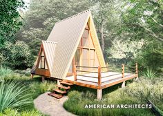 a - frame cabin in the woods with stairs leading up to it