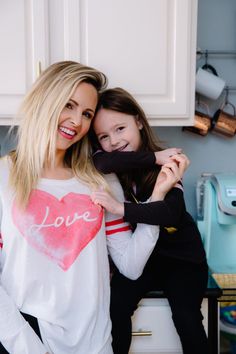 Click here to see mommy and me valentines day outfit ideas on Nashville Wifestyles! If you need Valentines outfits for women and kids, then you will love this blog post! Make sure to get inspired by these Valentines day outfit ideas for mommy and me. Get the ultimate Valentines day outfit ideas from this article today and wear a cute outfit with your kids! There's nothing more fun than dressing up for your valentines day with kids at home! #valentines #vdaylooks #valentinesday A Day In My Life, Day In My Life, Mom Fashion, Day Outfits, Valentine's Day Outfit