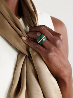 By Pariah's jewelry is inspired by the untouched beauty of the Caribbean peninsula it's named after. This 'Pebble' ring is hand-carved from chalcedony - believed to have healing and calming properties - and set with a 14-karat gold diamond-encrusted band. Elegant Green Enamel Ring With Polished Finish, Elegant Green Enamel Gemstone Ring, Luxury Green Jewelry With Polished Finish, Luxury Green Emerald Ring With Polished Finish, Elegant Green Oval Enamel Ring, Luxury Green Ring With Polished Finish, Luxury Green Rings With Polished Finish, Elegant Green Enamel Ring As A Gift, Elegant Green Enamel Ring For Gift