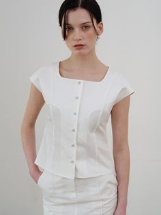 This is a comfortable and trendy top by ourcomos that is made out of high quality cotton and tencel blend fabric. With refined design detail with trendy look, it will stand out from your casual and feminine daily outfit.- Square neckline- Minimal and slim silhouette- Glossy buttons for cool and luxurious mood Fitted Cotton Modern Tops, Elegant Cotton Top For Workwear, Modern Fitted Cotton Top, Classic Summer Workwear Tops, Fitted Cotton Blouse With Short Sleeves, Fitted Cotton Top For Work, Fitted Cotton Tops For Day Out, Relaxed Fit Cotton Tops For Workwear, Modern White Blouse Relaxed Fit