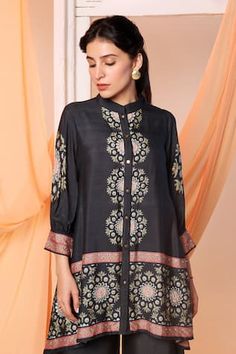 Black chanderi high low shirt style tunic with thread and sequin embellished circular motifs. Paired with coordinating flared pant. - Aza Fashions Chanderi Resham Embroidery Straight Kurta Top, Straight Kurta Top With Resham Embroidery In Chanderi, Designer Wear Blouse With Printed Motifs For Navratri, Navratri Designer Blouse With Printed Motifs, Designer Long Sleeve Tunic With Dupatta, Eid Tunic With Mirror Work, Anarkali Chanderi Tops For Eid, Embroidered Straight Kurta Top In Chanderi, Embroidered Chanderi Straight Kurta Top