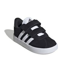 These kids' adidas Vl Court 3.0 shoes are a must-have for any child's wardrobe. Click this FOOTWEAR GUIDE to find the perfect fit and more! SHOE FEATURES With adjustable two-strap hook-and-loop closure, these shoes are easy to put on but tough for your little one to kick off The non-marking rubber cupsole ensures durability for fun and play, while the timeless design makes them the future of classic sportswearSHOE CONSTRUCTION Synthetic, leather upper Textile lining Textile midsole Rubber outsol Adidas Vl Court, Classic Sportswear, Hook And Loop Tape, White Core, Adidas Kids, Shoes Sneakers Adidas, Shoe Size Chart, Men Shoes Size, Synthetic Leather