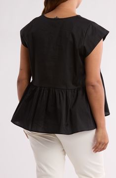 A peplum silhouette brings playful movement to this cotton poplin top that can be easily dressed up or down. 26" length (size 1X) Split neck Short sleeves 95% cotton, 3% spandex Machine wash, line dry Made in the USA Spring Poplin Tops With Relaxed Fit, Chic Poplin Top With Relaxed Fit, Casual Cotton Peplum Top, Summer Cotton Peplum Top, Casual Cotton Peplum Top For Spring, Spring Poplin Tops For Daywear, Fitted Cotton Peplum Top With Ruffle Hem, Spring Daywear Poplin Tops, Short Sleeve Ruffle Hem Top For Work