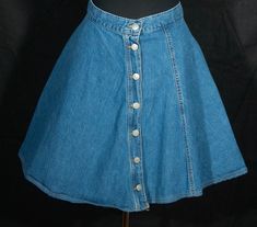 This is a sweet cotton denim jean mini circle skirt by the collectible vintage 1980's J.G. Hook made in U.S.A. label.  It is a sweet A line jean skirt that's not too mini and it has a great J.G. Hook embossed button down front in a nicely worn and soft medium blue wash pure cotton denim material. You'll love having this wardrobe staple in your collection because it can be mixed and matched with so many other pieces. It's really great. This jean skirt is in great preloved condition with normal si Mini Circle Skirt, 80s Jeans, Etiquette Vintage, Lined Jeans, J G, Denim Material, Skirt Vintage, Vintage Labels, Denim Mini