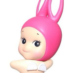 a toy doll with a pink bunny outfit on it's head and legs, sitting in front of a white background