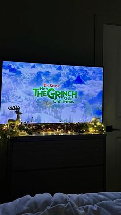 the grinch christmas movie is projected on a large screen