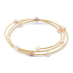 Iconic in every way, Biscayne is a beautifully designed adjustable wrap bracelet to wear anywhere. Wrap your wrist in two color combos for an easy and stylish look that adds bliss to every look. Each piece of jewelry created by The Freshwater Pearl Company features genuine freshwater cultured pearls. Our collections are proudly designed in Palm Springs and distributed in the U.S. from our San Diego studio for a touch of California coastal style. Pearl Size 5-6mm Pearl Colors White, Natural & Dar California Coastal Style, Pearl Party, Freshwater Pearl Bracelet, Bracelet Clasps, Pearl Grey, Freshwater Cultured Pearls, Wire Bracelet, Pearl Color, Pearl Size