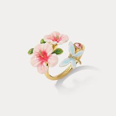 Hibiscus Ring is a piece of fancy jewelry. For its enamel paint, it’s also considered enamel jewelry. You can find it from Selenichast jewelry store. It is easy to wear and very trending. Stunning hibiscus jewelry gives satisfaction to women to add a floral, sweet and elegant touch to their everyday outfits. Lovely hibiscus jewelry that features enameled white-pink blooms, green leaves and a light blue butterfly give us delight in its loveliness and sweetness while its exquisite enameled workman Hibiscus Jewelry, Hibiscus Ring, Jewellery Organization, Dragonfly Ring, Beachy Jewelry, Pretty Accessories, Unique Gift Wrapping, Gloss Labial, Pottery Crafts