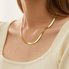 ✨Our 14K Gold Plated Sterling Silver Herringbone Chain Necklace, showcasing a timeless 3MM Snake Layering design. This adjustable piece, extending to 16 inches, is not only lightweight but also remarkably durable. It serves as a simple yet elegant accessory, capable of shining on its own or effortlessly enhancing any ensemble with its thin and sophisticated chain. 💫 🌟 Embrace the trendiness embodied in the 3MM Flexible Flat Magic Herringbone Necklace - a harmonious blend of elegance and strength. Perfect for daily wear, this versatile accessory can stand alone, complement a pendant, or be layered with other necklaces. Ensures suitability for any occasion, be it a formal night out or a casual day, infusing a touch of sophistication into your personal style. ✨ Product Specification: ------ Necklace For Best Friend, Layering Design, Gold Herringbone Necklace, Gold Herringbone Chain, Herringbone Chain, Herringbone Necklace, For Your Best Friend, Layering Necklace, Elegant Accessories