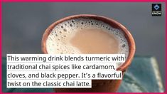 a close up of a cup of coffee with a caption in the middle that reads, this warming drink blends turmic with traditional chai spices like cardamom, cloves and black pepper it's a