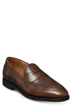 A streamlined silhouette and almond toe bring timeless sophistication to a leather loafer grounded by a cushioned footbed. Leather upper, lining and sole Made in the USA Classic Calf Leather Almond Toe Slip-ons, Classic Calf Leather Slip-ons With Round Toe, Classic Calf Leather Slip-ons For Formal Wear, Classic Slip-ons With Leather Footbed For Business Casual, Classic Slip-on Dress Shoes With Almond Toe, Classic Brown Loafers With Textured Sole, Classic Calf Leather Slip-ons With Plain Toe, Classic Slip-ons With Plain Toe In Calf Leather, Classic Slip-on Loafers With Textured Sole