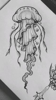 an ink drawing of a jellyfish and flowers