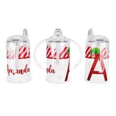 three glass mugs with candy canes and the letters a, b, and c on them