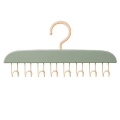 a green hanger with white pins and a wooden hook on the top of it