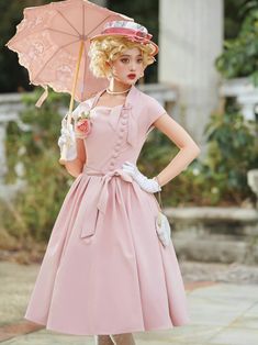 A classic dress that looks like the main character of a 1950s Western movie. This item has a light color that resembles cherry blossoms. The neck part can be tied with a ribbon, and the vertical button closure gives it an elegant look. Tie it tightly at the waist to look like a gorgeous lady. 
 
 
 Size 
 
 XS size 
 
 Length: 108cm 
 Bust: within 80cm 
 Waist: within 62cm 
 Skirt length: 65cm 
 
 S size 
 
 Length: 108cm 
 Bust: within 85cm 
 Waist: within 66cm 
 Skirt length: 65cm 
 
 M size 1950s Style Vintage Dress For Events, Feminine Dresses For Spring Vintage Events, 1950s Style Vintage Dress For Formal Occasions, Elegant Pink Dress For Tea Party, Classic Spring Dresses For Vintage Events, Classic Dresses For Spring Vintage Events, Classic Dresses For Vintage Events In Spring, Elegant Pink Vintage Dress For Formal Occasions, Elegant Pink Vintage Dress For Garden Party