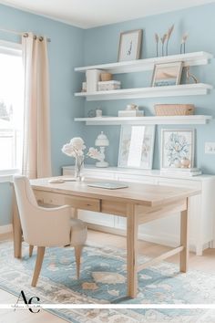 a home office with blue walls and white shelving above the desk is decorated in pastel tones