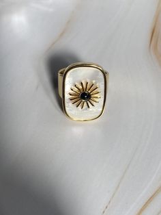 Brand new  💕Handcrafted  ✨Due to the one-of-a-kind nature of natural stone pieces, exact colour and stone patterns may vary slightly Beautiful high quality that is nickel and lead free. Ring is 18K gold plated and tarnish resistant COLOURGold  SIZEApprox 2.2 cm L x 1.6 cm W Size 7, Inner Diameter: 17mm Material18K Plated Gold Brass White Mother of Pearl with Onyx sun centre Weight9.7g 💌 Price includes free TRACKED shipping within Australia + free cardboard ring box and limited edition My Rose Luxury Handmade Rectangular Jewelry, Handmade Yellow Gold Rectangular Jewelry, Handmade Rectangular Yellow Gold Jewelry, Unique Rectangular Rings With Natural Stones, Elegant Rectangular Rings With Natural Stones, Elegant Rectangular Natural Stone Rings, Handmade Modern Jewelry With Rectangular Stone, Unique Rectangular Natural Stone Rings, Luxury White Rectangular Jewelry