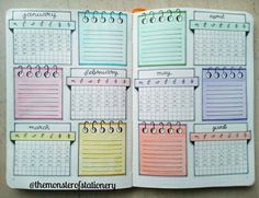 an open planner with colorful calendars on it