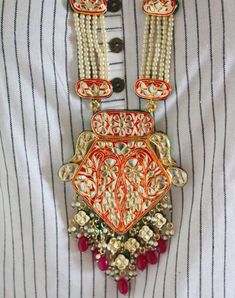 Jadau Kundan Long Rani Haar Necklace Earrings Set, Indian Bridal Wedding Fashion Necklace Earrings Jewellery Set, Minakari Necklace Pearls Free Fast Shipment Metal = Gold Plated Occasion = Wedding ,Party Wear, Bridal Color = Red and White Size = Necklace Length = 15 Inches , Earring Size = 3 Inches 100% Satisfaction Guarantee: 1 Year Warranty, Long Lasting Plating, High-Quality Stones Occasion: Perfect choice for any Indian occasion. Care: It is advisable that you keep products away from direct Red Dangling Beads Jewelry For Wedding, Red Ruby Necklace For Festive Occasion, Red Wedding Jewelry With Dangling Beads, Red Round Beads Temple Jewelry, Red Round Beads Pearl Necklace For Wedding, Red Pearl Necklace Temple Jewelry For Festivals, Red Pearl Temple Jewelry Necklace For Festivals, Red Pearl Necklace With Round Beads For Wedding, Red Temple Jewelry Pearl Necklace For Festivals