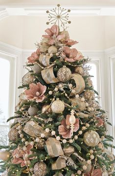 a decorated christmas tree with ornaments on it