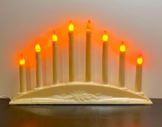 a hanukkah with seven lit candles on it