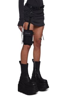 has adjustable straps and quick release buckle hardware. This belt bag has a single pocket leg garter design with a top zip closure and jacquard logo graphics. Utility Belts Arm, Punk Utility Belt, Functional Streetwear Belt Bag With Adjustable Strap, Waist Belt Pouch Thigh Bag, Fishnet Tops, Apocalyse Belt Bag, Leg Garter, Rave Clothes, Fishnet Top