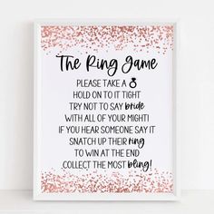 the ring game print with pink and gold glitters on it, against a white background