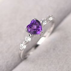 Elegant Purple Heart Ring For Anniversary, Sterling Silver Purple Birthstone Ring With Center Stone, Purple Sterling Silver Birthstone Ring With Center Stone, Elegant Purple Heart Promise Ring, Amethyst Birthstone Ring With Center Stone For Promise, Purple Amethyst Diamond Ring Birthstone, Purple Amethyst Diamond Ring, Birthstone, Purple Amethyst Diamond Birthstone Ring, Purple Diamond Amethyst Birthstone Ring