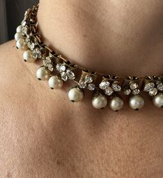 The Vintage Pearl Drop and Link Choker Necklace with Rhinestones is 14" (plus extender) x  3/4". The size varies from 13 1/2" - 16" in length. It has a lovely book link chain with three rhinestones on each link. The old rhinestones are very shimmery and elegant.  Stunning 1940's statement necklace. Thank you for visiting  HATTIE MAUDE VINTAGE !  Buying a piece of history is the best way to shop sustainably    And  please reach out with any questions ! Pearl Choker Vintage, Vintage Pearl, Vintage Pearls, Pearl Choker, Choker Necklaces, Pearl Chain, Link Necklace, Pearl Drop, Link Chain