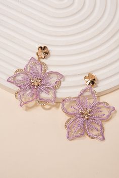 Make a statement with these beautiful Rhinestone Fabric Flower Earrings. These earrings are handmade with fabric flowers, embellished with shimmering rhinestones, creating a stunning and eye-catching look. Perfect for any special occasion or to add a touch of glamour to your everyday look. Shop now and add these unique earrings to your jewelry collection today! Size Length: 2.5 in (6.35 cm)Width: 2 in (5.08 cm) QualityEarrings are layered with two different flowers. Bottom flower with rhinestone Spring Party Flower Earrings With 3d Flowers, Spring Party 3d Flower Earrings, Elegant Purple Flower Earrings For Party, Spring Party Beaded Earrings With Flower Shape, Elegant Beaded Earrings For Spring Party, Gold Flower Earrings With Handmade Details For Party, Spring Flower-shaped Beaded Earrings For Party, Elegant Flower-shaped Beaded Earrings For Party, Elegant Spring Beaded Earrings For Party