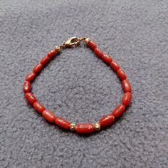 Red Coral Bracelet, 100% Natural Italian Red Coral Bracelet, Red Coral Handmade Charming Bracelet, Best Quality Smooth Beads Bracelet... Gemstone : Natural Red Coral  Bracelet Weight : 26.70 Carat   Bracelet Length;- 7 Inches  Color : As Seen In Picture Payment policy We accept the payment via PayPal only. Shipping policy We Ship the item as per our shipping policy once we receive the payment. We understand that getting your items quickly is important to you, so we make every effort to process y Red Coral Bracelets With Polished Beads As A Gift, Red Coral Bracelet With Polished Beads As A Gift, Beaded Red Coral Round Bead Bracelets, Red Beaded Coral Bracelets, Red Coral Bracelet With Polished Beads, Red Coral Beaded Bracelet For Gifts, Red Polished Beads Bracelet As Gift, Red Polished Beads Bracelet For Gift, Red Coral Beaded Bracelets With Round Beads