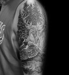 a man with a deer and eagle tattoo on his arm