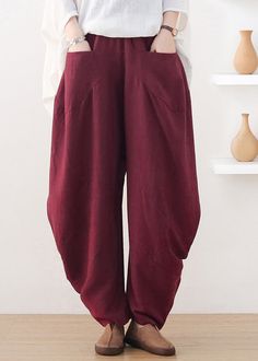 Plus Size Wine Red Pockets Wide Leg Pants FallFabric: Cotton 45%, Linen 55%Size & Fit: This garment fits true to size.Length: Size 3XL measures 37.83"from waist to hem.Waist:Fitted - elastic waist allows stretch Hip: Loosely Fitted. room for hips. Hand Wash Cold. Burgundy Cotton Wide Leg Pants, Casual Burgundy Wide-leg Pants, Casual Burgundy Pants With Pockets, Baggy Red Harem Pants With Pockets, Casual High Waist Burgundy Pants, Red Ankle-length Cotton Harem Pants, Red Cotton Harem Pants For Fall, Red Baggy Harem Pants With Pockets, Red Cotton Ankle-length Harem Pants