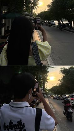 two people are taking pictures of the sunset on their cell phones while riding motorcycles down the street