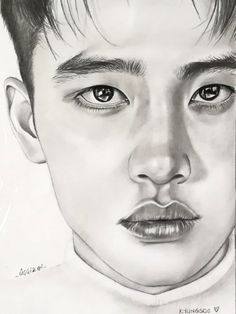 a pencil drawing of a young man's face