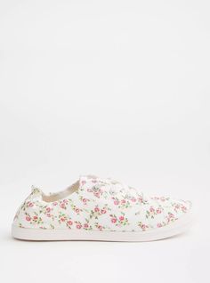 In a lightweight floral canvas, these sneakers give you the best of both worlds with a design that’s as practical as it is pretty. Our unique fit gives you extra wide width and extra room around your whole foot. EXTRA WIDE WIDTH (WW). Round toe. Lace-up top. Extra cushioned footbed; rubber sole. Man-made materials. Imported extra wide width shoes. The best plus size women's riley ruched sneaker (ww) sneakers in floral made of canvas. Rock your look from Torrid to Festivals like Coachella and Lol Trendy Floral Print Sneakers For Spring, Textile Low-top Sneakers With Floral Print, Floral Print Textile Low-top Sneakers, Floral Print Textile Lace-up Sneakers, Trendy White Fabric Canvas Shoes, White Textile Sneakers For Spring, Trendy Textile Canvas Shoes For Spring, Trendy Spring Textile Canvas Shoes, Floral Print Textile Sneakers For Spring