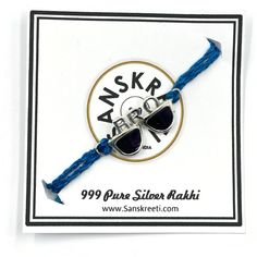 "Description 999 Pure Silver (99.9% silver purity) BRO (brother) Rakhi / Bracelet for Raksha Bandhan, it comes with handmade Jute / Cotton adjustable string and suitable for Youngs and adults. included gift bag with Red Roli & Chawal pouches. Ethnic Significance: Also known as \"Traditional Rakhi \" in India. Dimensions Rakhi / Bracelet Silver Weight: ~4.0-5.0 grams / Piece. 1 Pcs Rakhi : ~4.0-5.0 grams (Length =1.0 inch, Height=0.5 inch, Gender =Kids, Youth, Adults) Usage Pure Silver Rakhi is I Adjustable Fusion Style Sterling Silver Bracelet For Gift, Adjustable Sterling Silver Fusion Bracelets, Sterling Silver Fusion Bracelets, Traditional Silver Jewelry For Friendship, Om Buddha, Silver Rakhi, Turquoise Charm, Jordan 11 Retro Low, Chandler Az