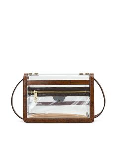 Lots of occasions now call for clear bags. From concerts to stadiums to museums, Patricia has proven that clear doesn't have to be ho hum, and the Consilina Clear Bag is crafted like our iconic Consilina Crossbody. With a floret twist-lock closure, it is a great styling choice even if clear isn't a necessity. The full-grain leather strap is adjustable and detachable, so you've got carry options.¬† 100% PVC, 100% full-grain leather trim Interior: faux suede lining, 100% polyester at bottom of bag Clear Pouch Bag For On-the-go, Clear Shoulder Bag With Clear Strap For Versatile Use, Rectangular Clear Plastic Shoulder Bag For Travel, Clear Satchel With Clear Strap For Travel, Clear Rectangular Bag With Removable Pouch, Travel Satchel With Clear Strap, Clear Travel Satchel With Clear Strap, Clear Crossbody Satchel With Clear Strap, Travel Clear Satchel With Clear Strap