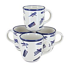 three white and blue coffee mugs sitting next to each other