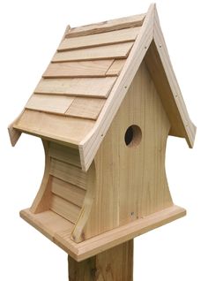 a bird house made out of wood