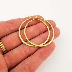 Big and bold, these are the thickest hoops that Aris Designs offers. With a hammered finish that catches the eye, these gorgeous solid gold earrings offer you the chance to elevate your outfit with carefree ease and stand out from the crowd. Gold Hoop Earrings Style, Lifetime Jewelry, Thick Gold Hoops, Thick Hoop Earrings, Hammered Hoop Earrings, Special Gifts For Her, Gold Jewelry Simple, Woman's Fashion, Solid Gold Earrings