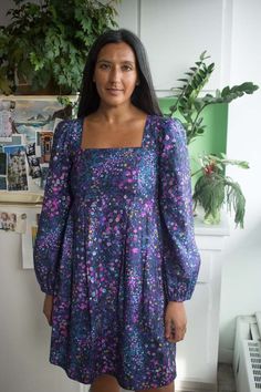 Birds of north america's tailorbird dress is here for fall! this dress has an empire waist silhouette square neck and full sleeves that gather into an elasticized hem. it has pockets hidden in the side seams and closes with a back invisible zipper. we love the sweet cotton print!    sizing notes: this style fits true to size.     marie is 5'1" and is wearing 2x    100% cotton    fabric does not have much stretch to it    wash cold hang to dry    made in canada    also available in triffids & quatrefoil America Dress, Birds Of North America, Vegan Clothing, A Perfect Circle, Satin Skirt, Womens Size Chart, Full Sleeves, Invisible Zipper, The Sweet