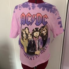 Nwt Pink And Purple Tie Dye Ac/Dc Short Sleeve Tee. Size S In Women. Trendy Purple Tops With Letter Print, Casual Purple Top With Graphic Print, Purple 90s Style Spring Tops, Trendy Purple Top With Graphic Print, Purple 90s Style Tops For Spring, 90s Style Purple Tops For Spring, 90s Graphic Print Purple Top, 90s Style Purple Top With Graphic Print, 90s Purple Tops For Spring