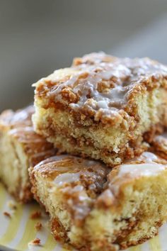 several pieces of cinnamon roll on a plate