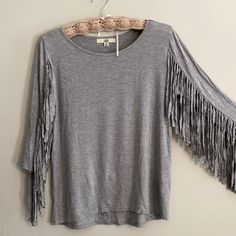 Nwot Ya Los Angeles Sz Med Bought At A Mountain Boutique In Beautiful Nccotton/Rayon 3/4 Sleeves With Fringe. This Top Is Adorable!! Western Look! Fun!! Wear With Blue Jeans And Boots! Wear With A Vest! Just Wear It For A Fun Day Out!!! Long Sleeve Fringe Tops For Summer, Spring Cotton Tops With Fringe, Cotton Fringe Tops For Spring, Gray Summer Top With 3/4 Sleeves, Gray 3/4 Sleeve Top For Summer, Gray 3/4 Sleeve Summer Top, Gray 3/4 Sleeve Tops For Fall, Gray Half Sleeve Top For Fall, Gray Half Sleeve Tops For Spring