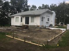 a house is being built in the yard